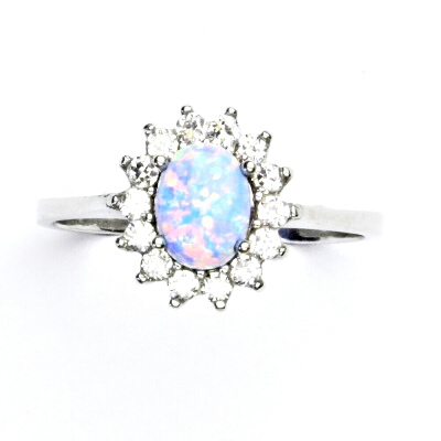 Stříbrný prsten, světle modrý syntetický opál, čiré zirkony, Kate, T 1507