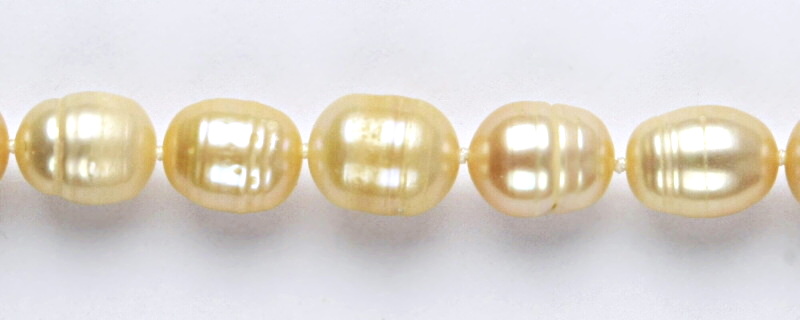 Perlový náhrdelník, přírodní říční perly lososové, 11-12 mm, stříbrné zapínání