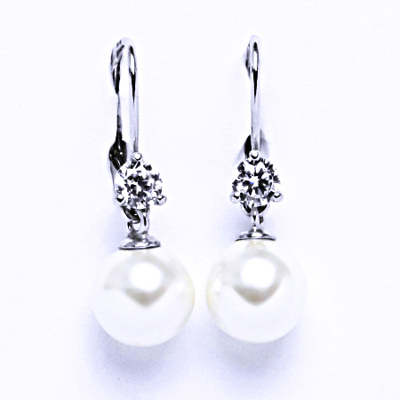 Stříbrné nušnice se Swarovski perlou 8 mm a čirým zirkonem VE 211